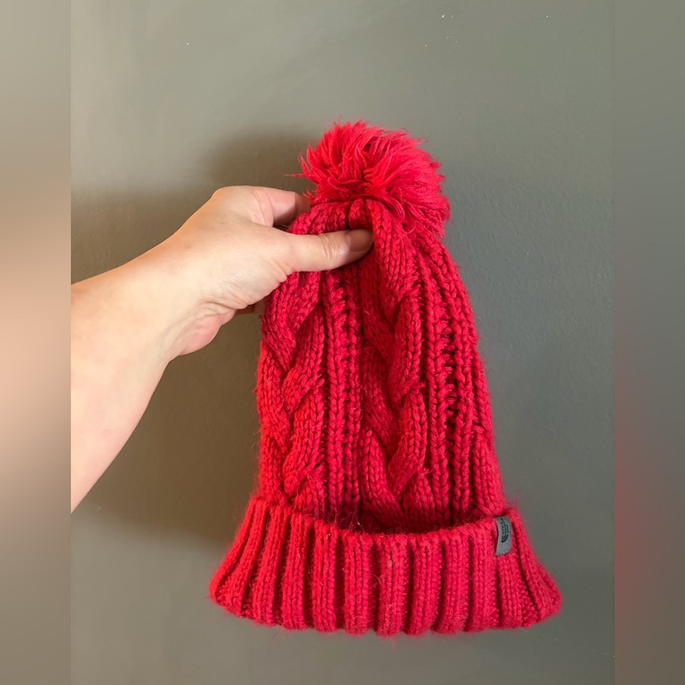The North Face red cablekit Pom Pom beanie toque hat